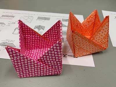[Two Coasters or Candle Holders]